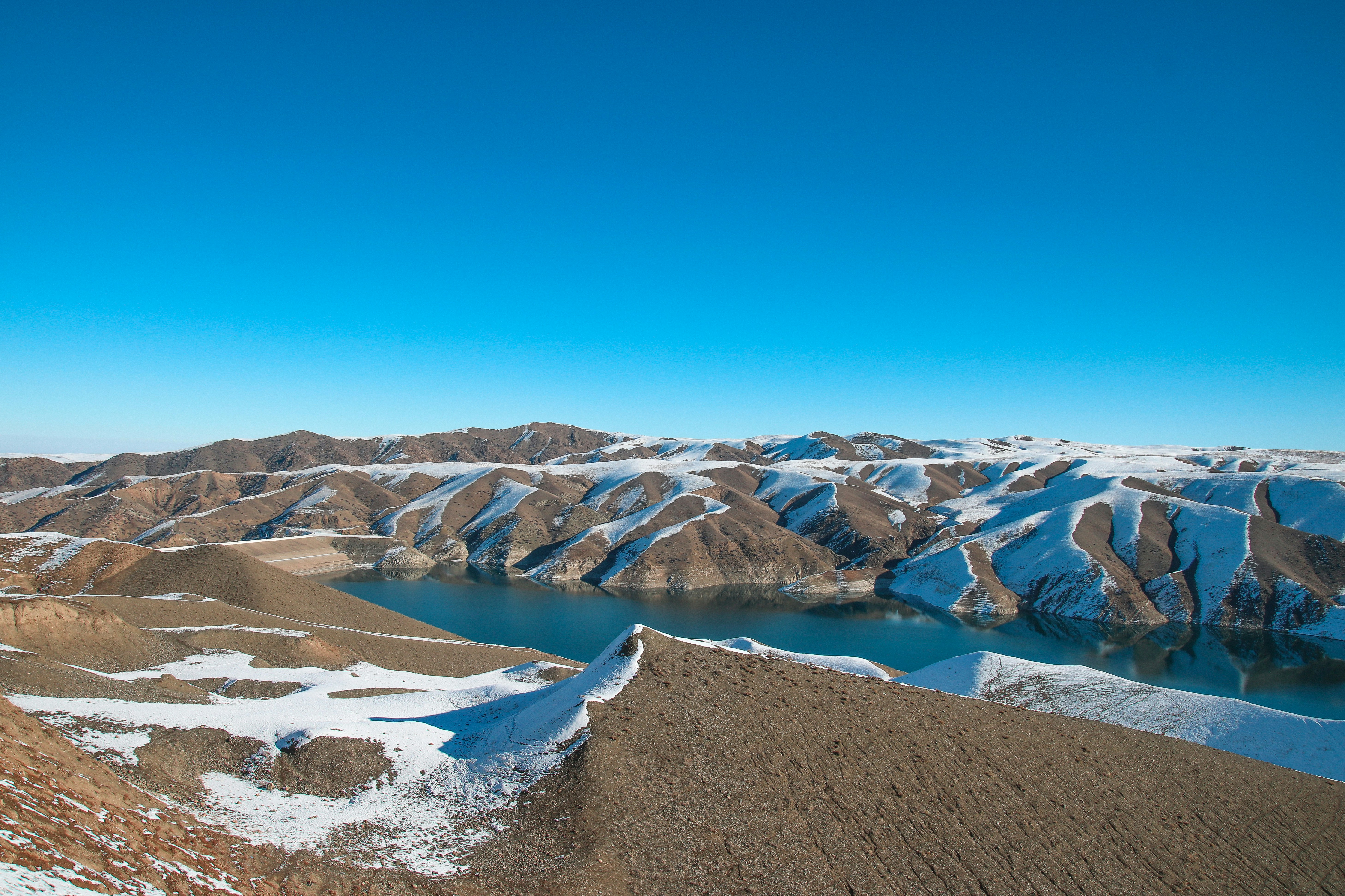snow covered mountains under blue sky during daytime, 