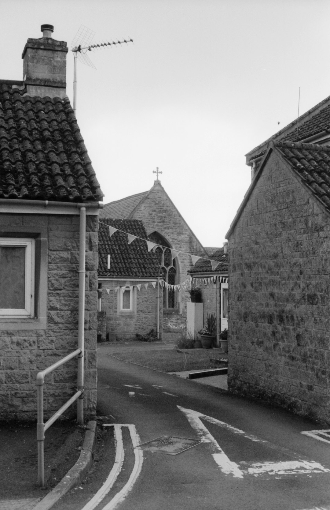 grayscale photo of brick building