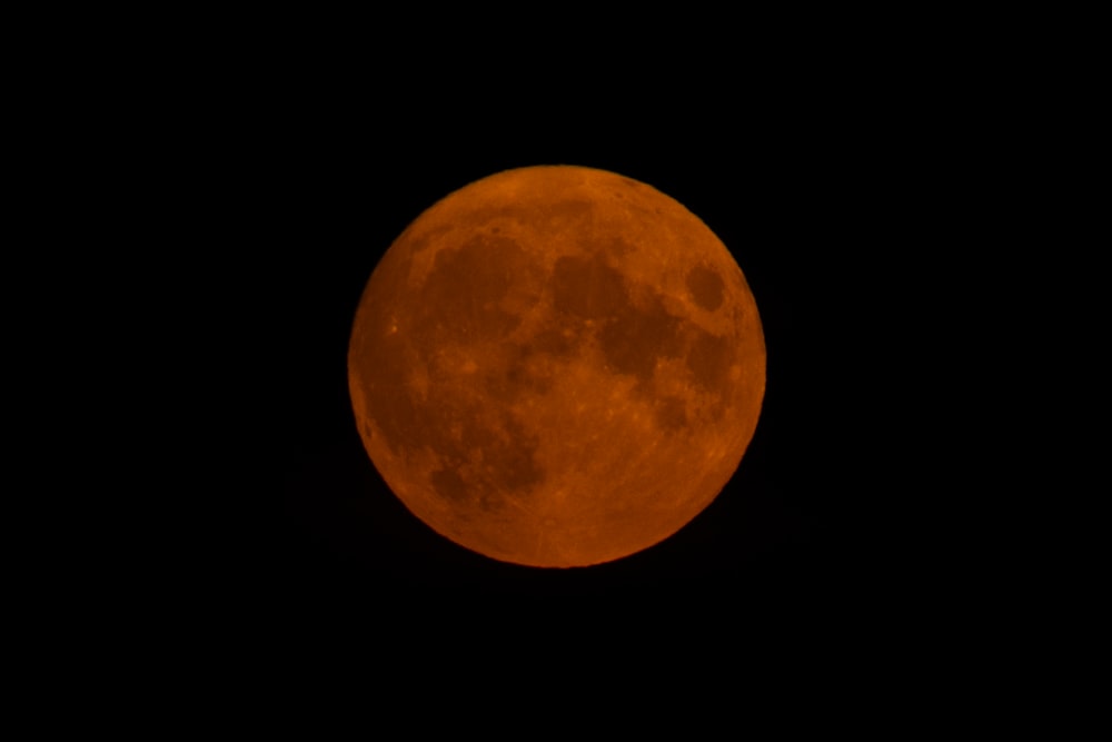 full moon in dark night sky