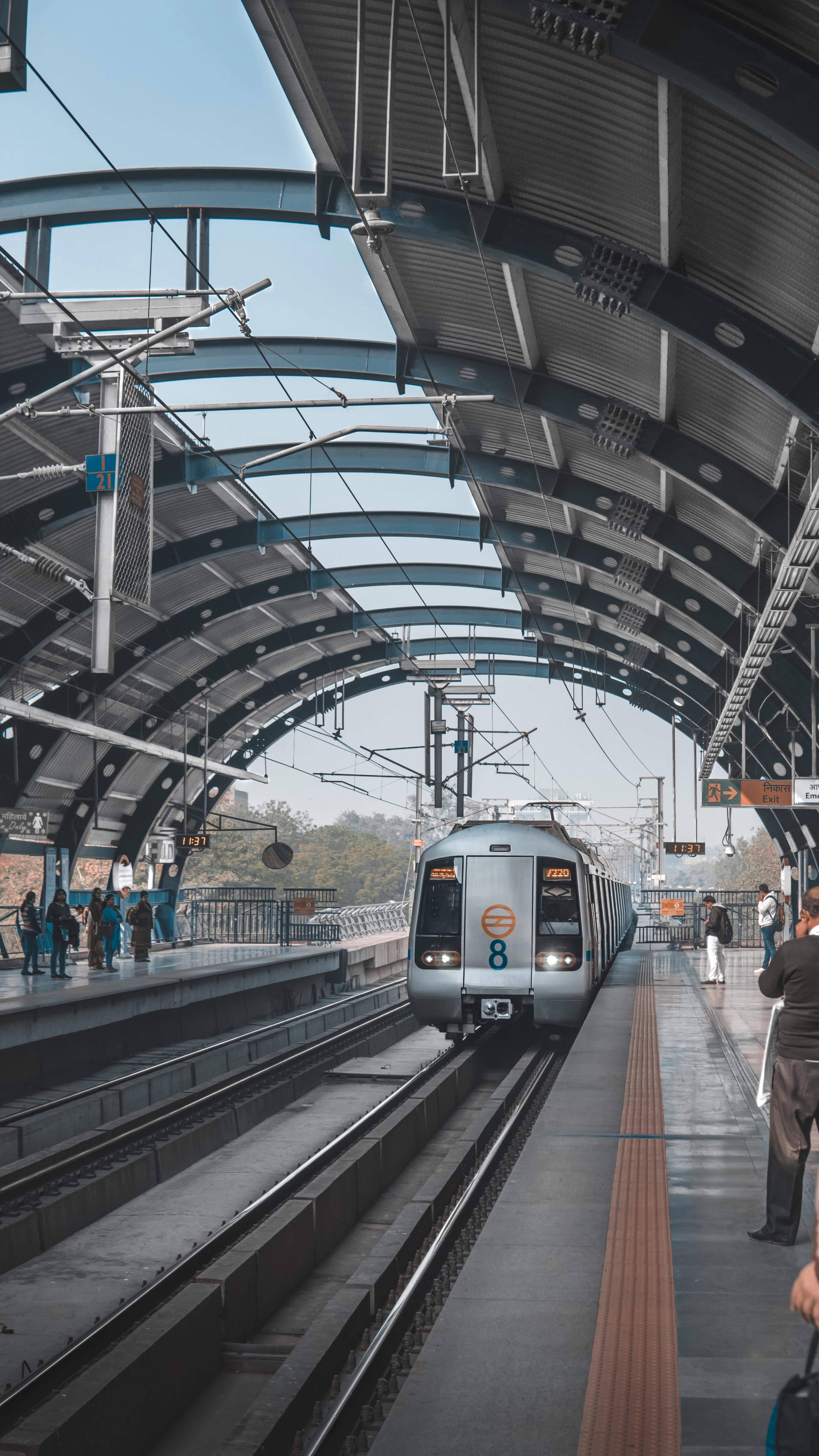 Commuters on a Delhi Metro platform