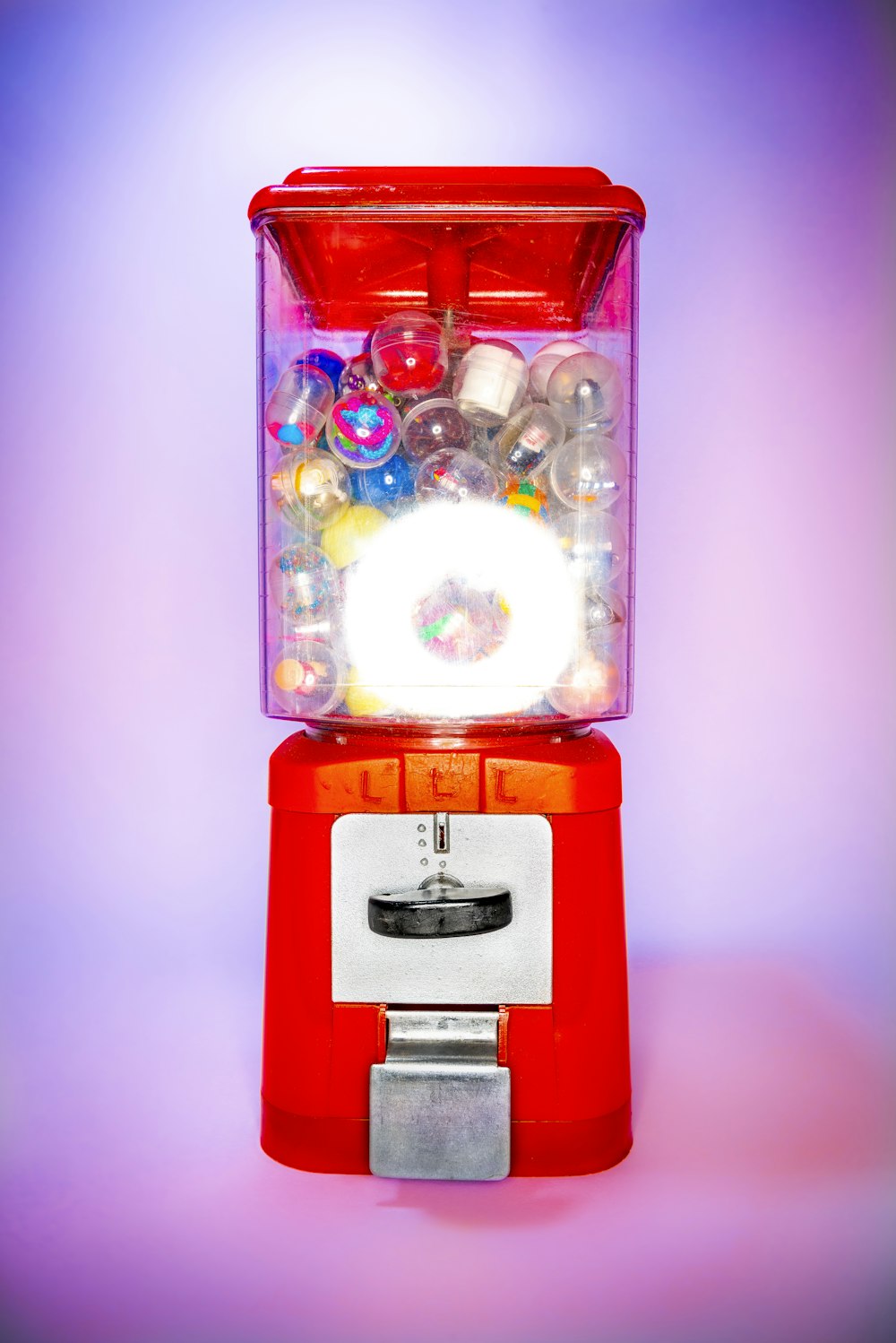red and white candy dispenser