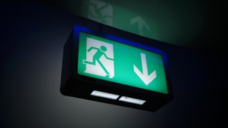 black flat screen tv turned on displaying x