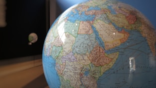 blue and brown desk globe