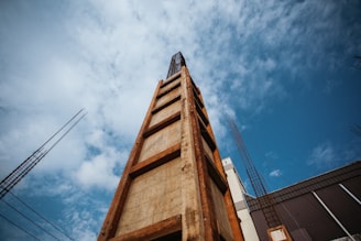 brown concrete building under blue sky during daytime