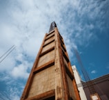 brown concrete building under blue sky during daytime