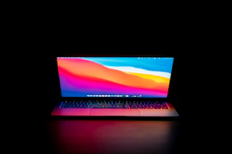 Colorful modern laptop setup with vibrant backgrounds
