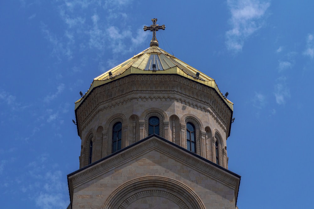 white and brown concrete church under blue sky during daytime