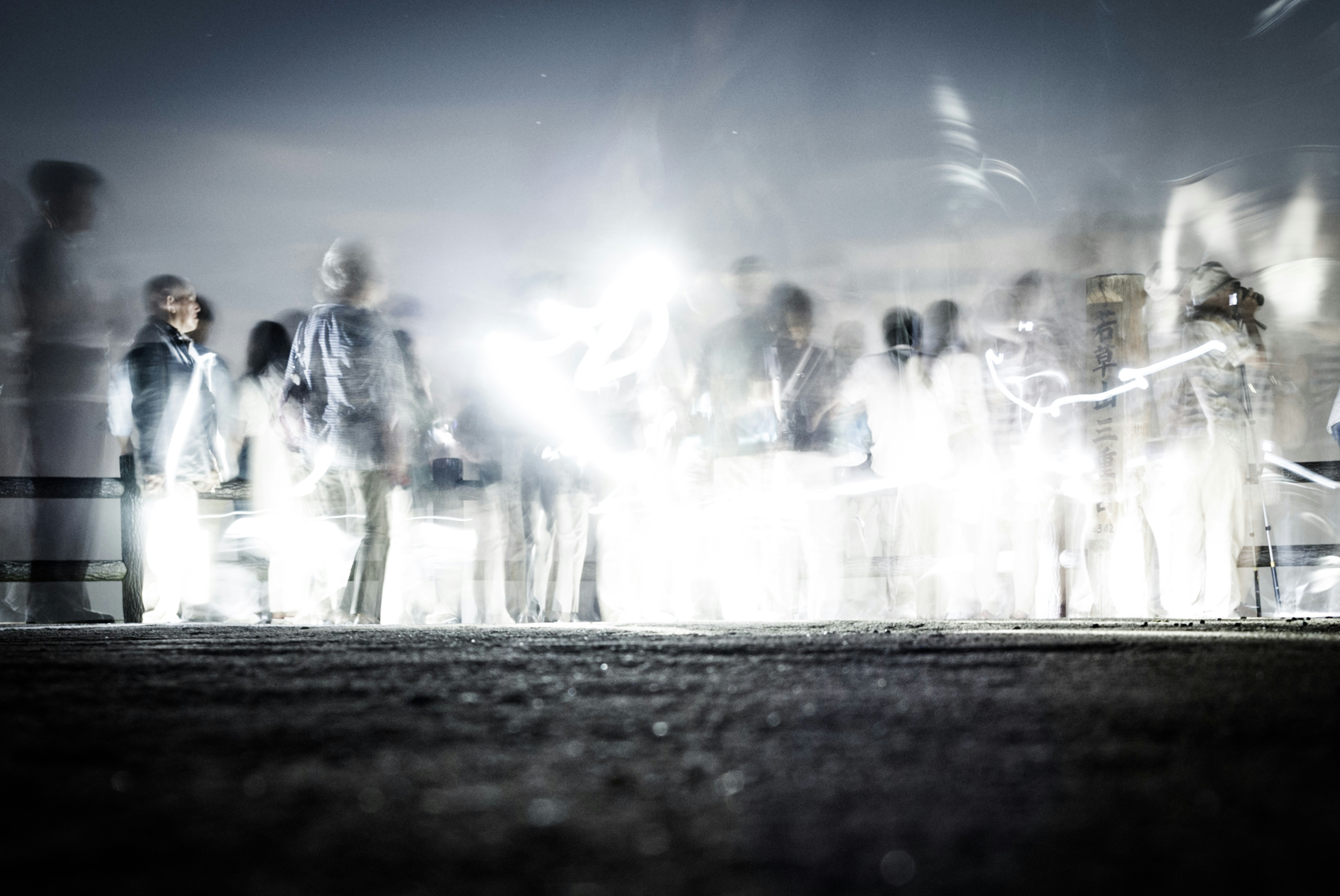 people walking on snow covered ground during daytime