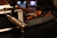 A close-up of a microphone in a soundproof studio, symbolizing professional voice recording.