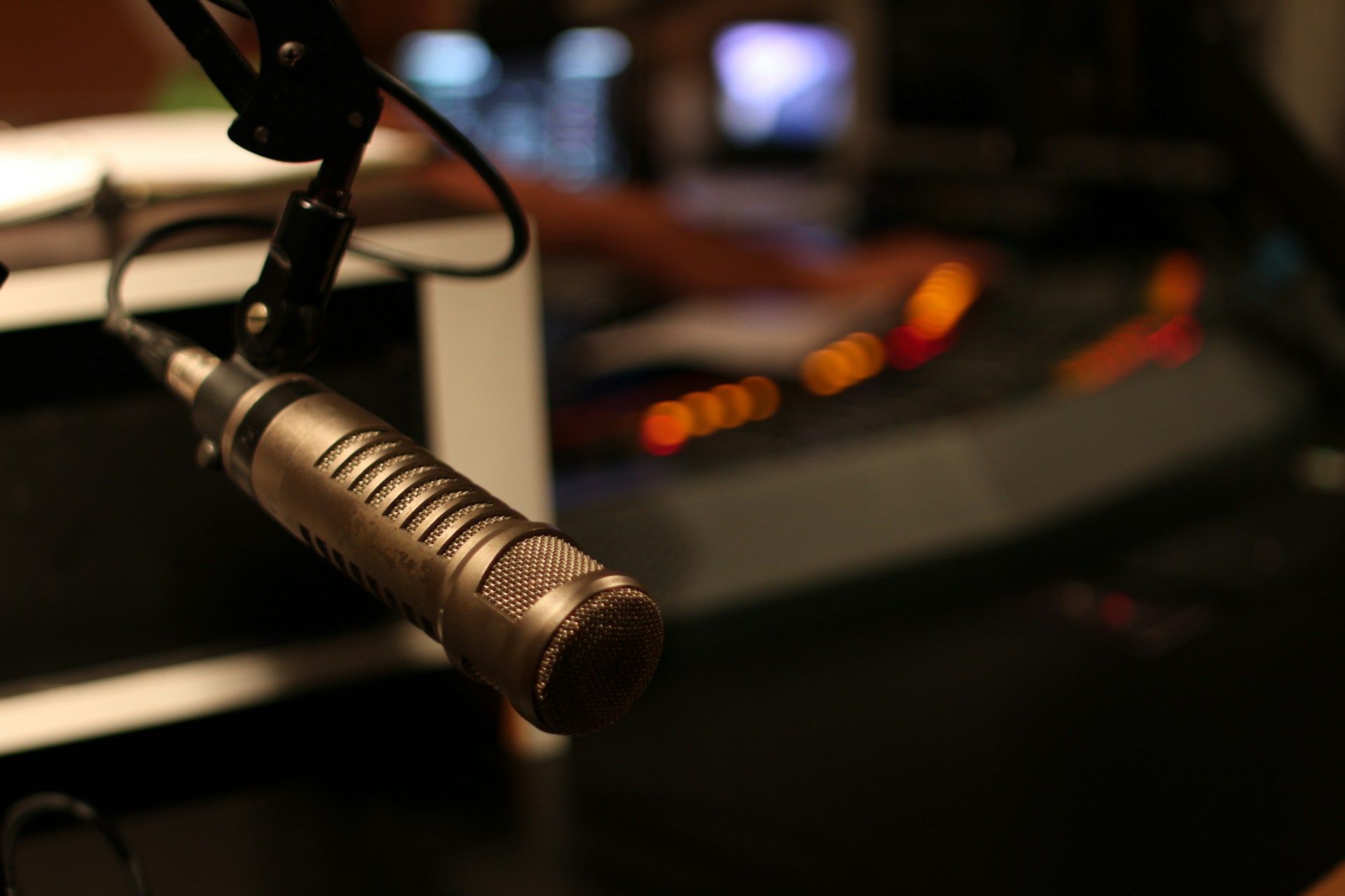 black and gray microphone with stand
