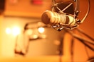 grey microphone on stand in room
