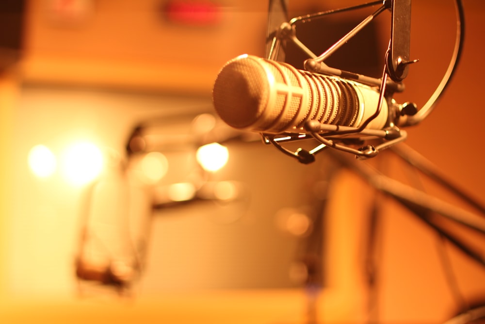 grey microphone on stand in room