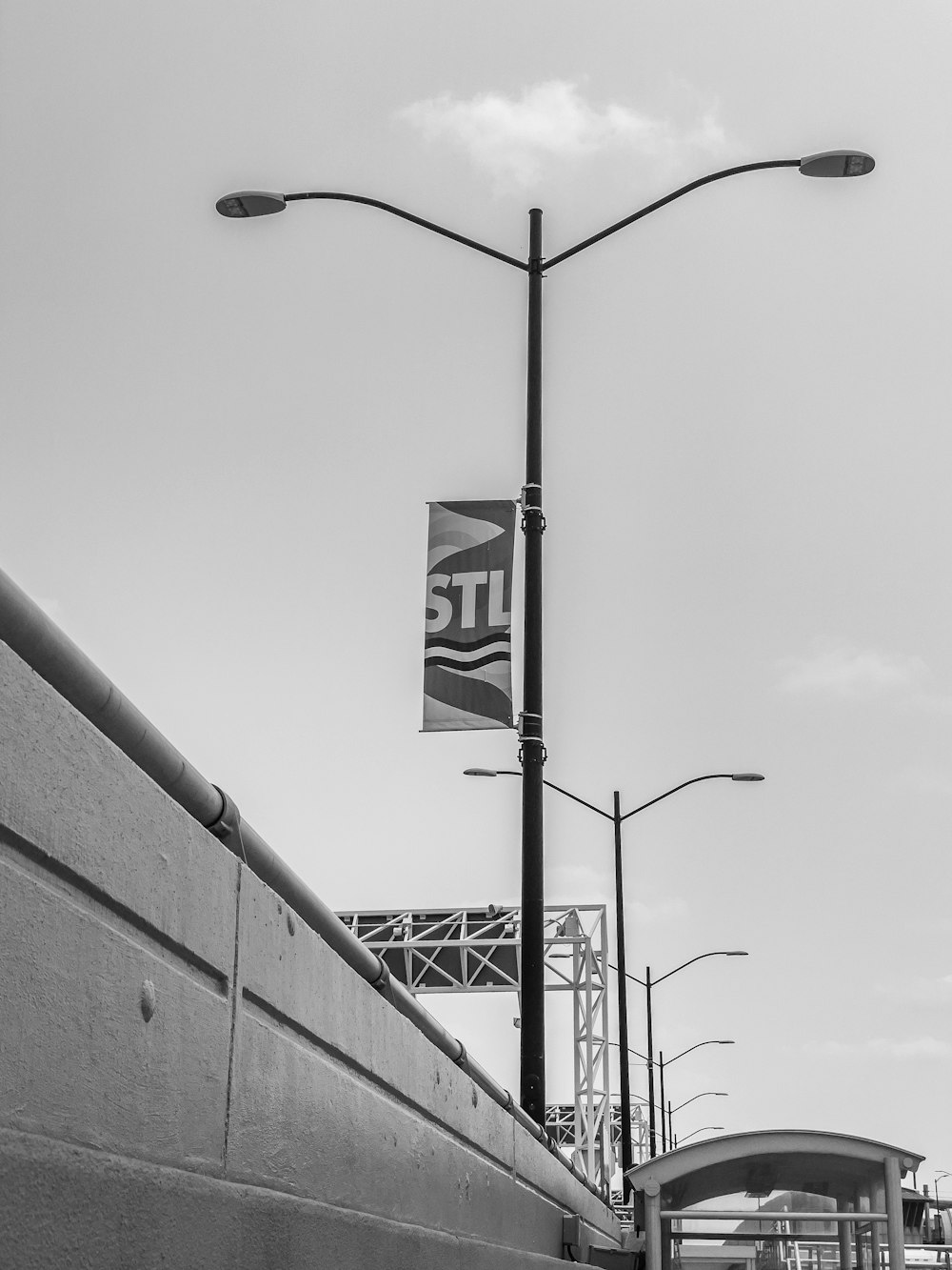 grayscale photo of stop sign