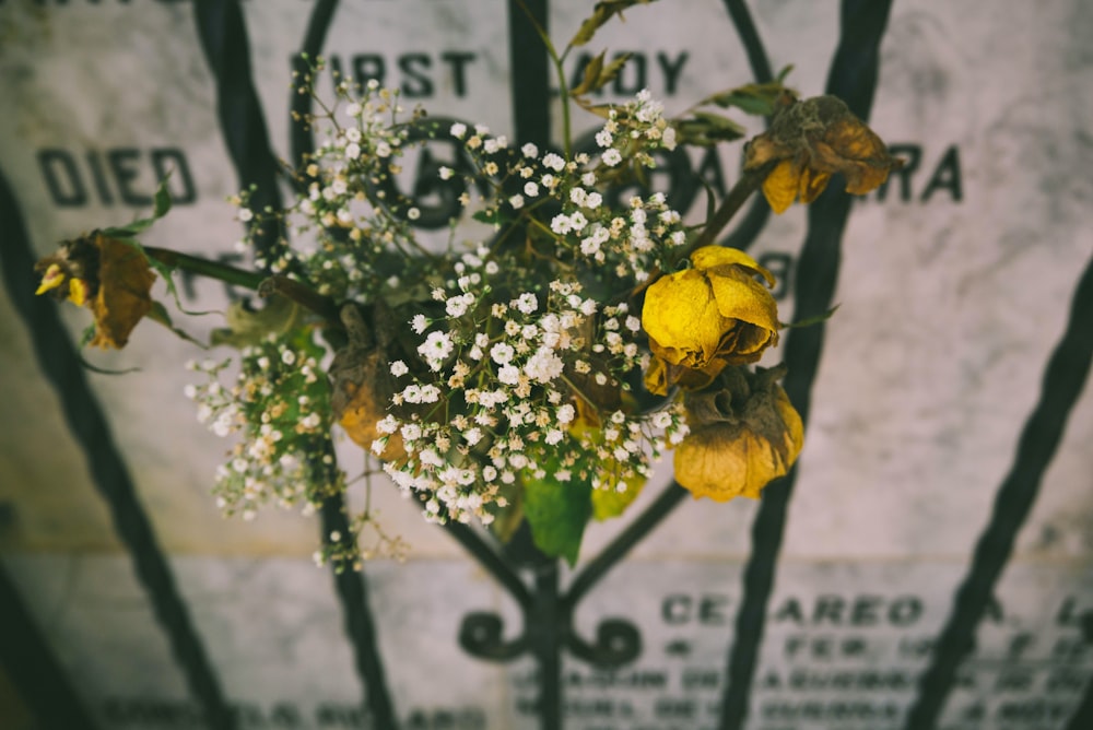 a bunch of flowers that are in a vase