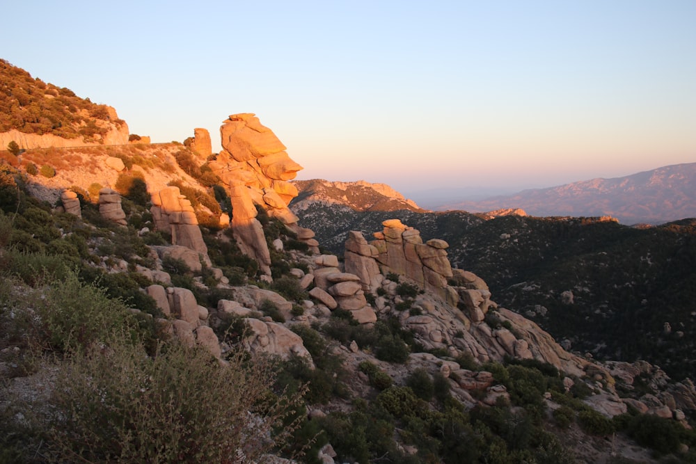 brown rocky mountain under blue sky during daytime