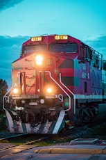 brown and yellow train on rail tracks