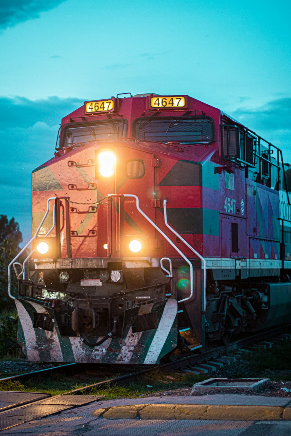 brown and yellow train on rail tracks