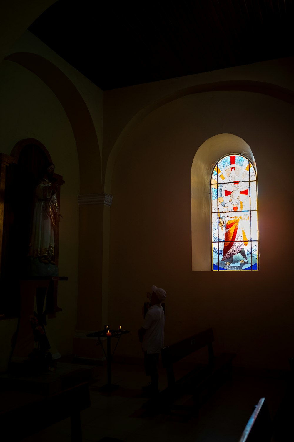 man and woman standing in front of cathedral