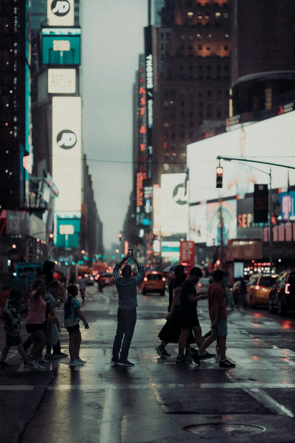 people walking on pedestrian lane during daytime