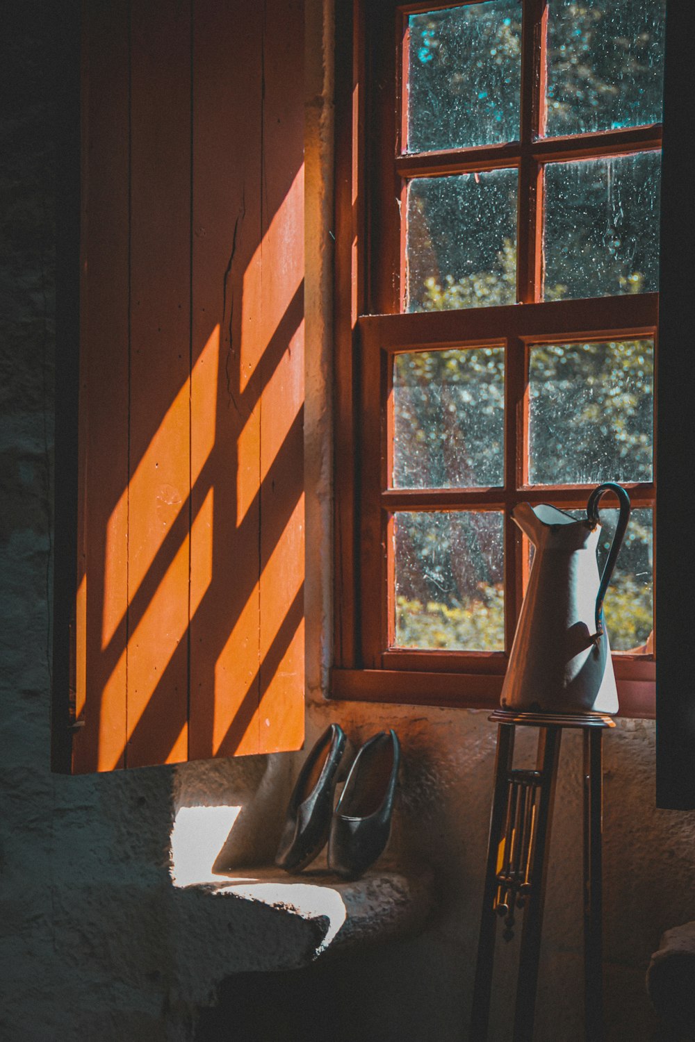 brown wooden framed glass window