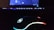 A close-up of a gaming setup with colorful lights and a focused player immersed in gameplay.