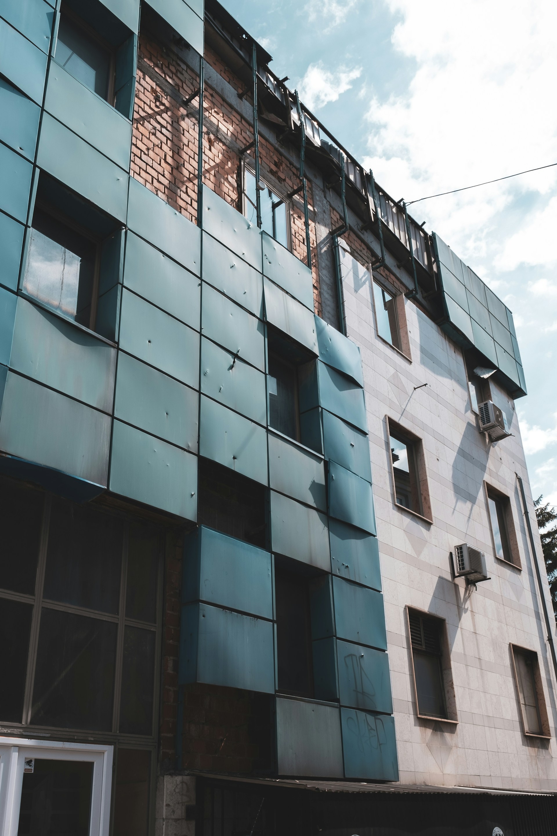 black and brown leather padded tub sofa