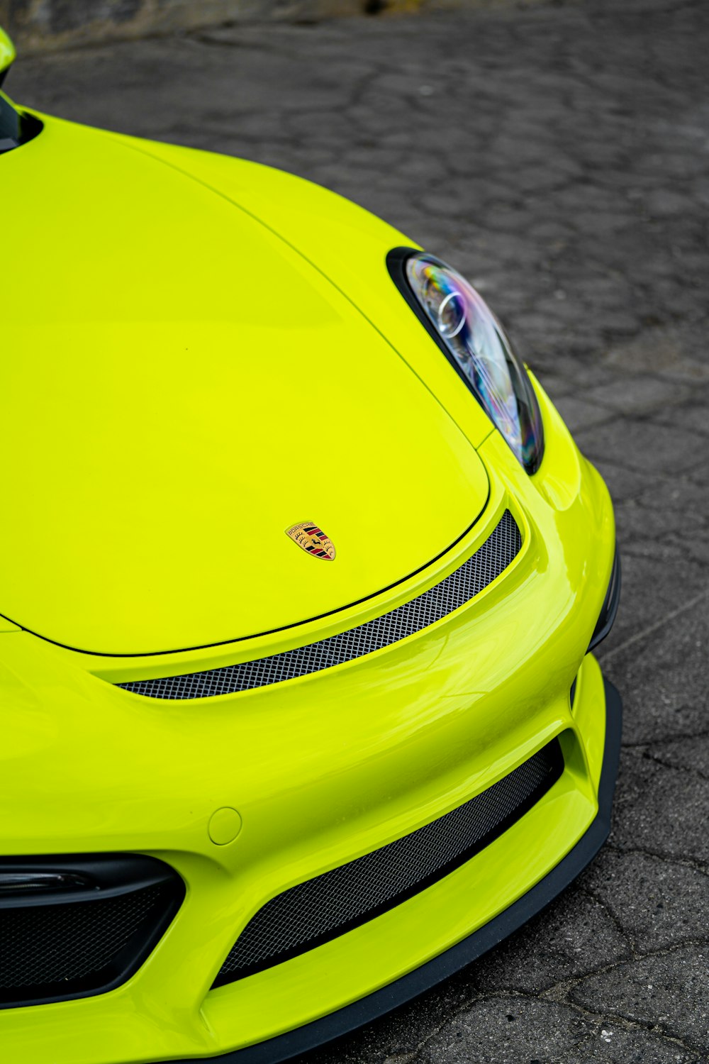 yellow ferrari car on road during daytime