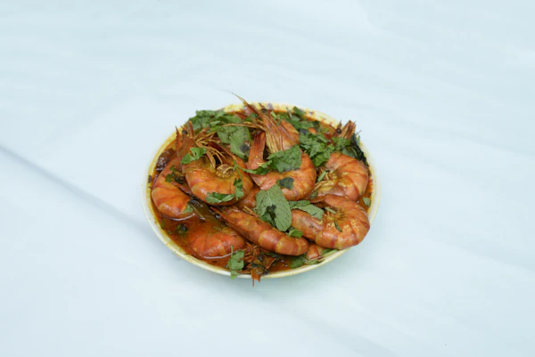 Prawns tossed dry with roasted spices, curry leaf and shallots, Kerala ularthiyathu style