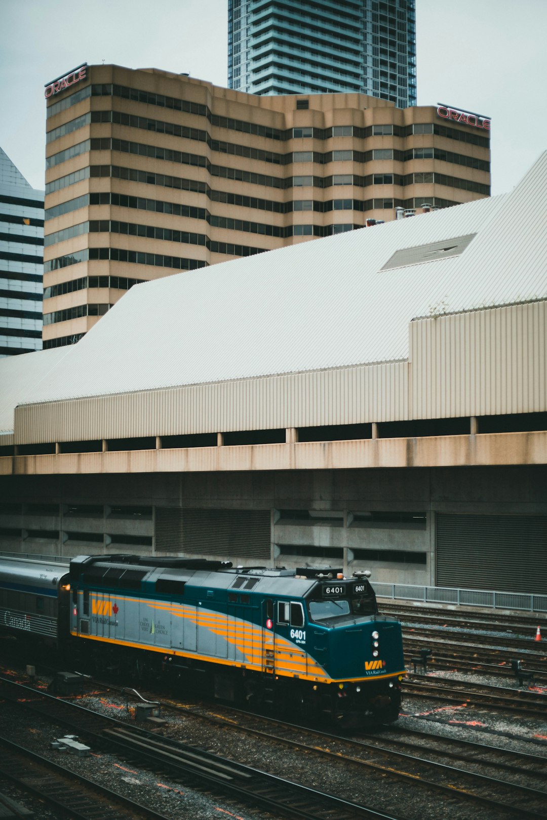 blue and yellow train on rail road