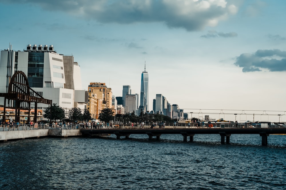 city skyline under gray cloudy sky during daytime