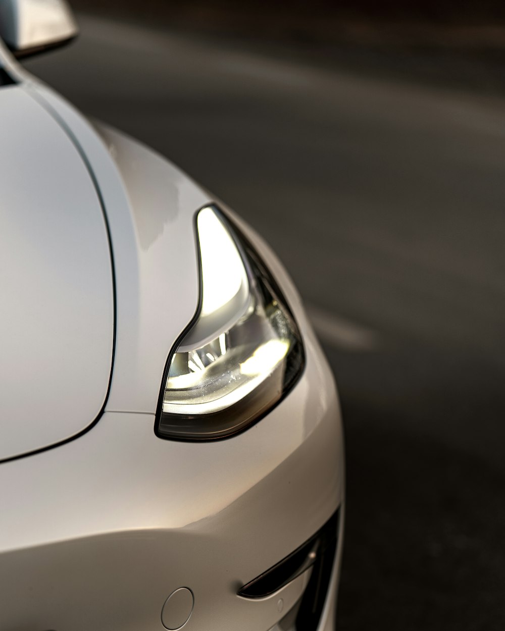 grayscale photo of car on road