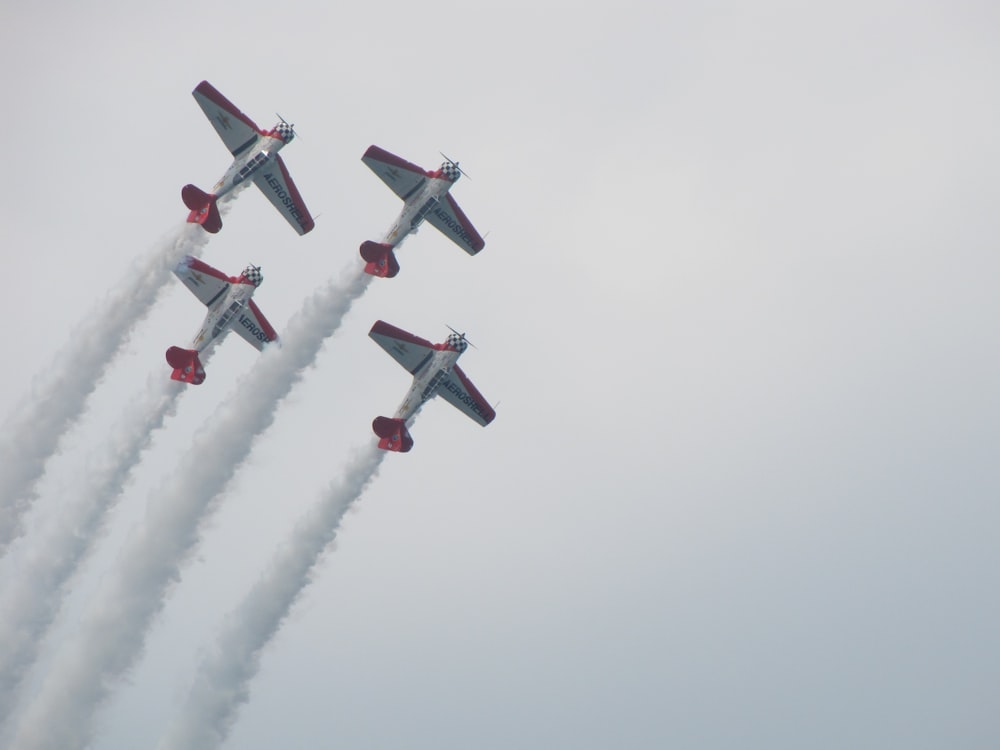 four fighter planes in the sky