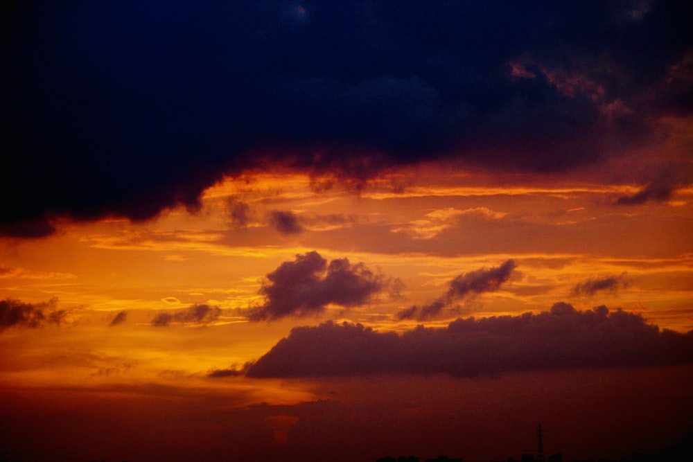 silhouette of building during sunset