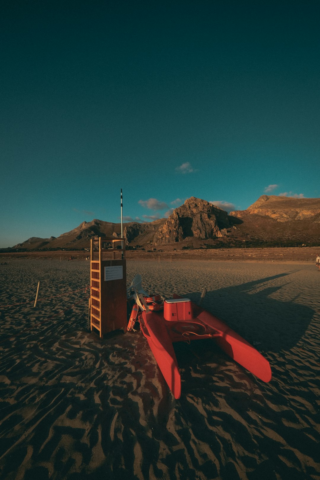 brown wooden dock on brown sand during daytime