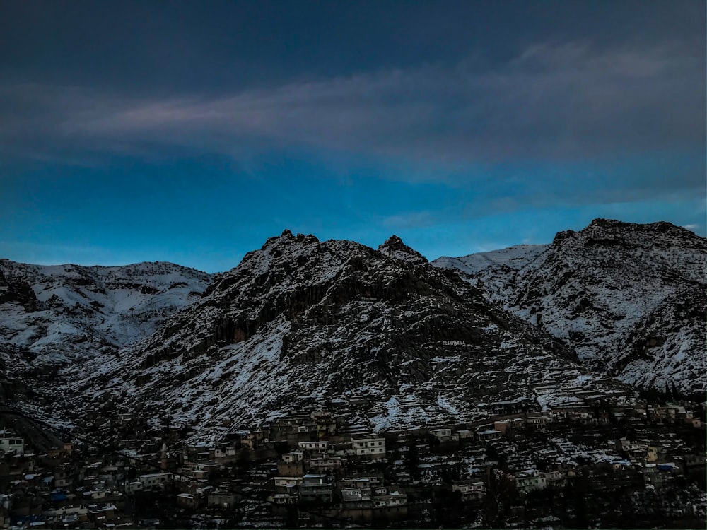 brown and white mountain under blue sky during daytime