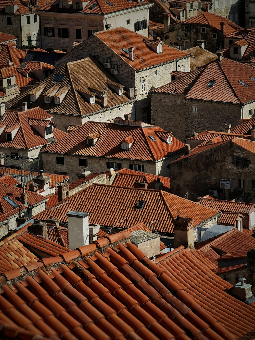 brown roof tiles during daytime