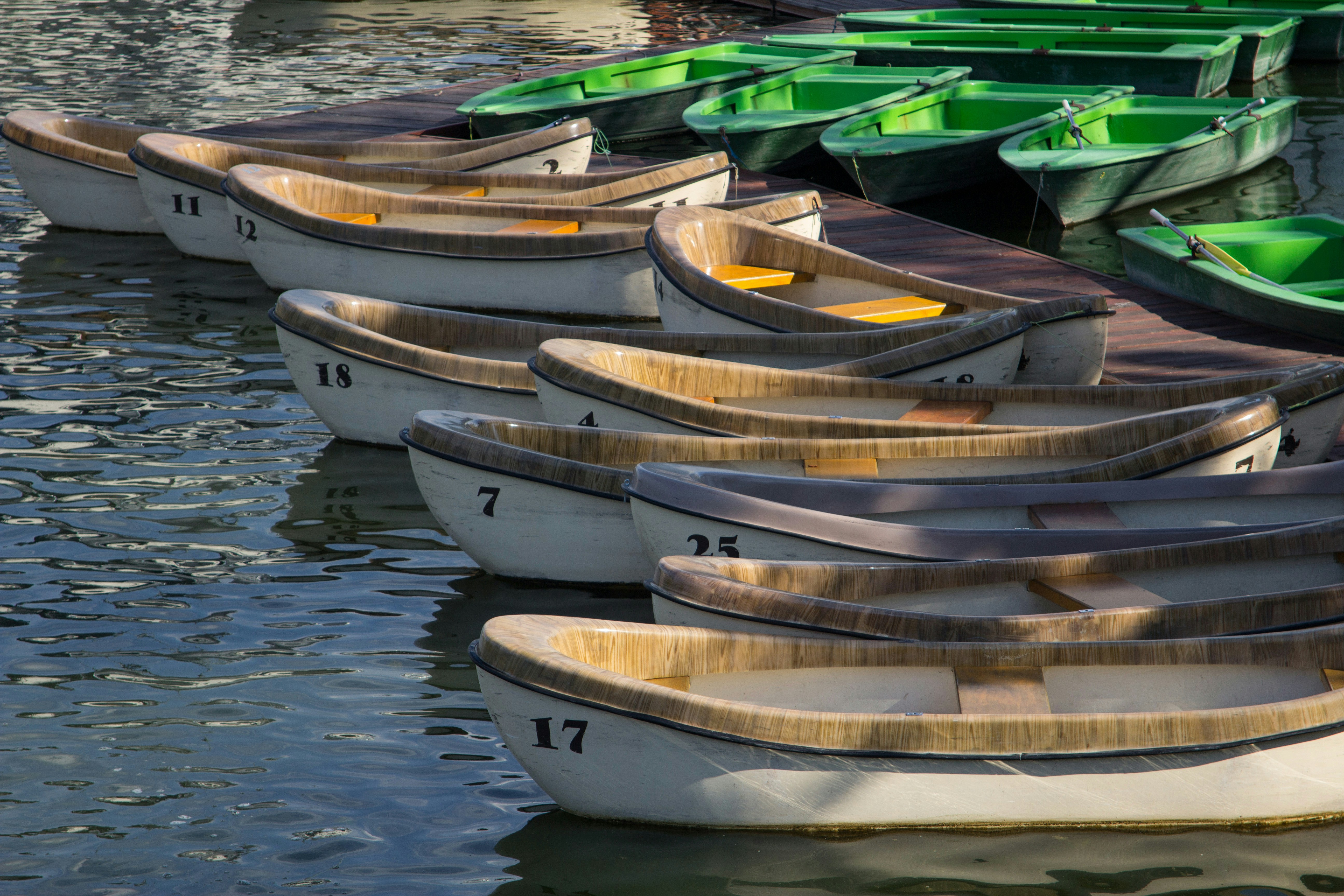 brown wooden boat on water