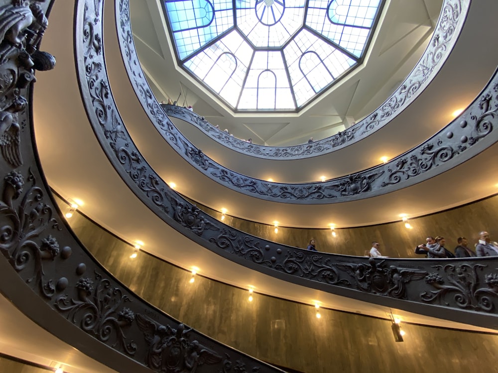 white and brown spiral staircase