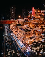 city with high rise buildings during night time