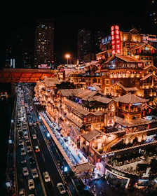 city with high rise buildings during night time