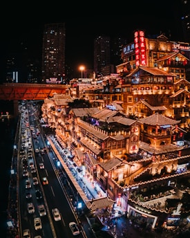 city with high rise buildings during night time