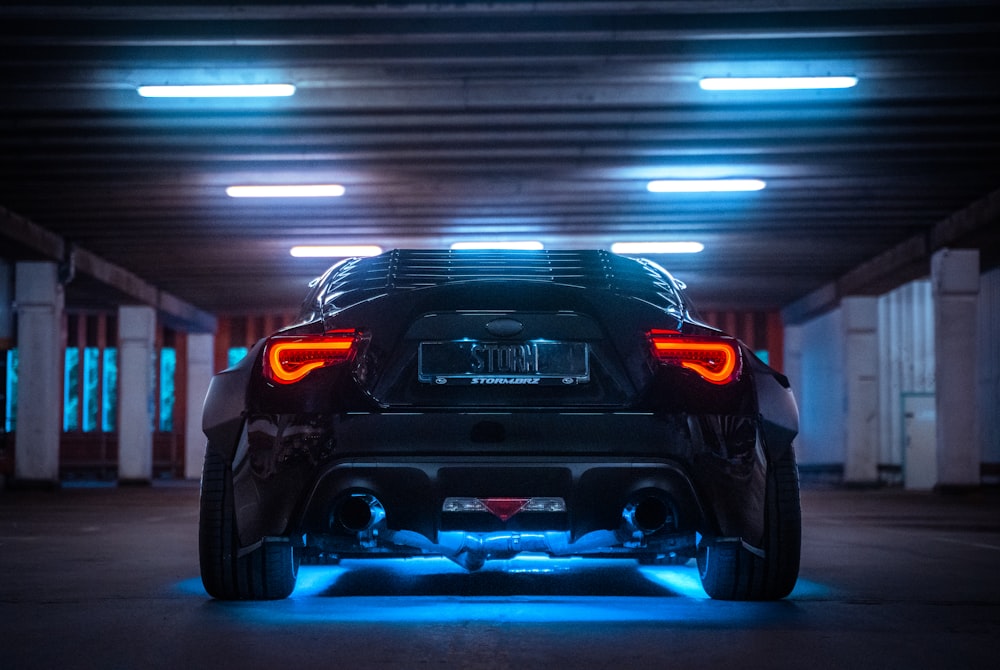 black suv in a garage