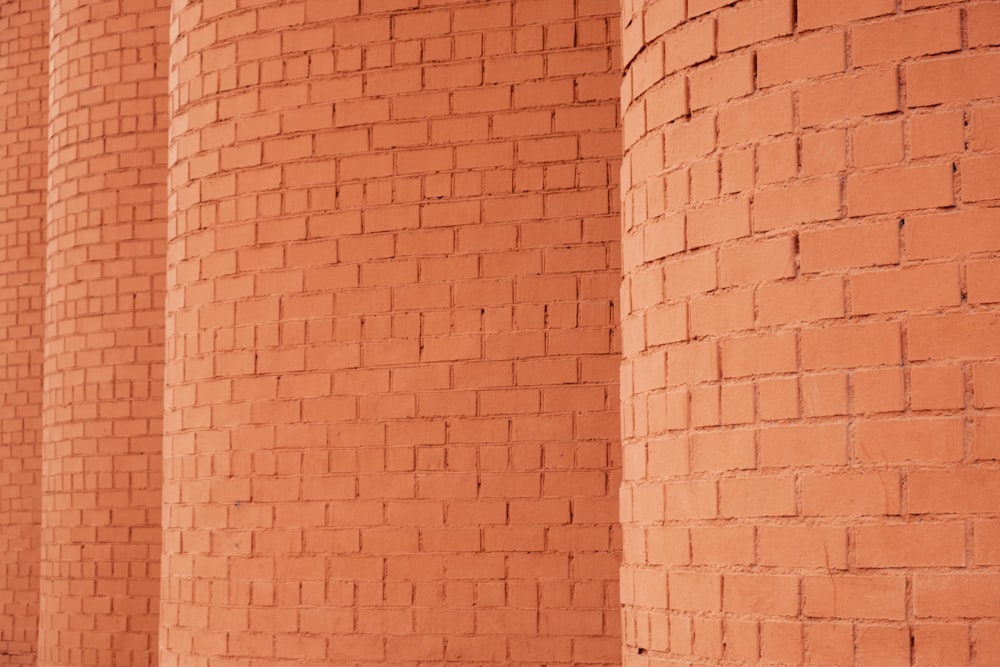 brown brick wall during daytime