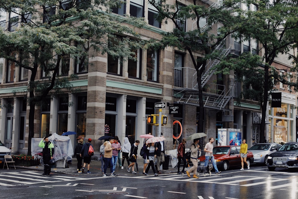 people walking on pedestrian lane during daytime