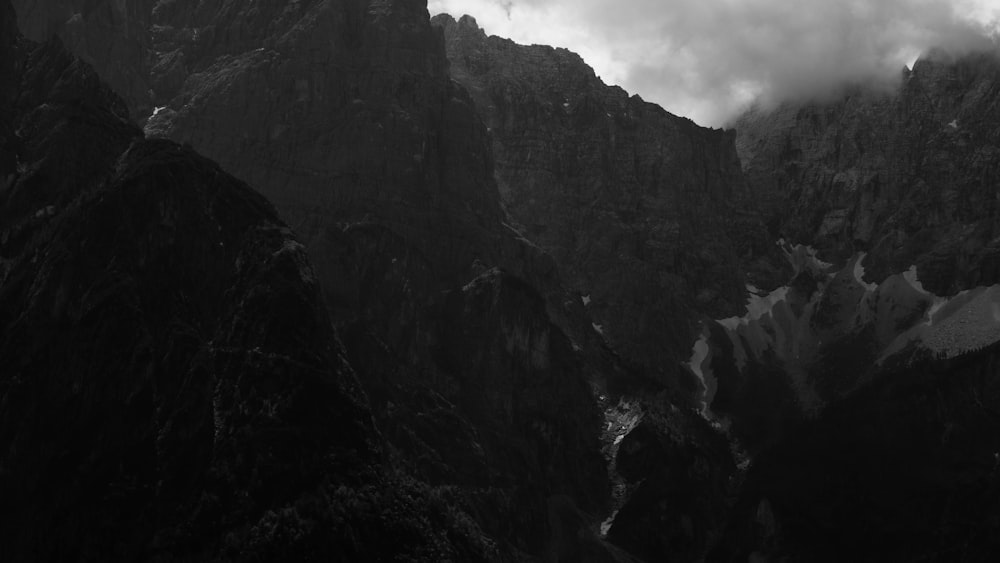 grayscale photo of mountain range