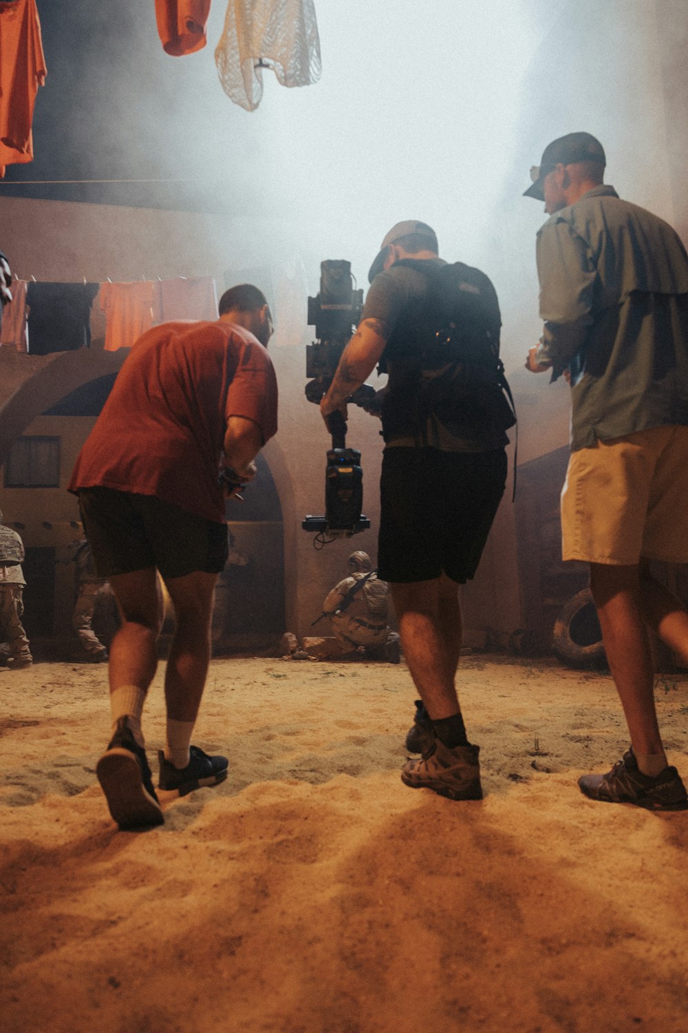 people standing on brown sand during nighttime