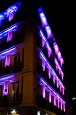 Brightly lit municipal building showcasing LED lighting solutions at night.