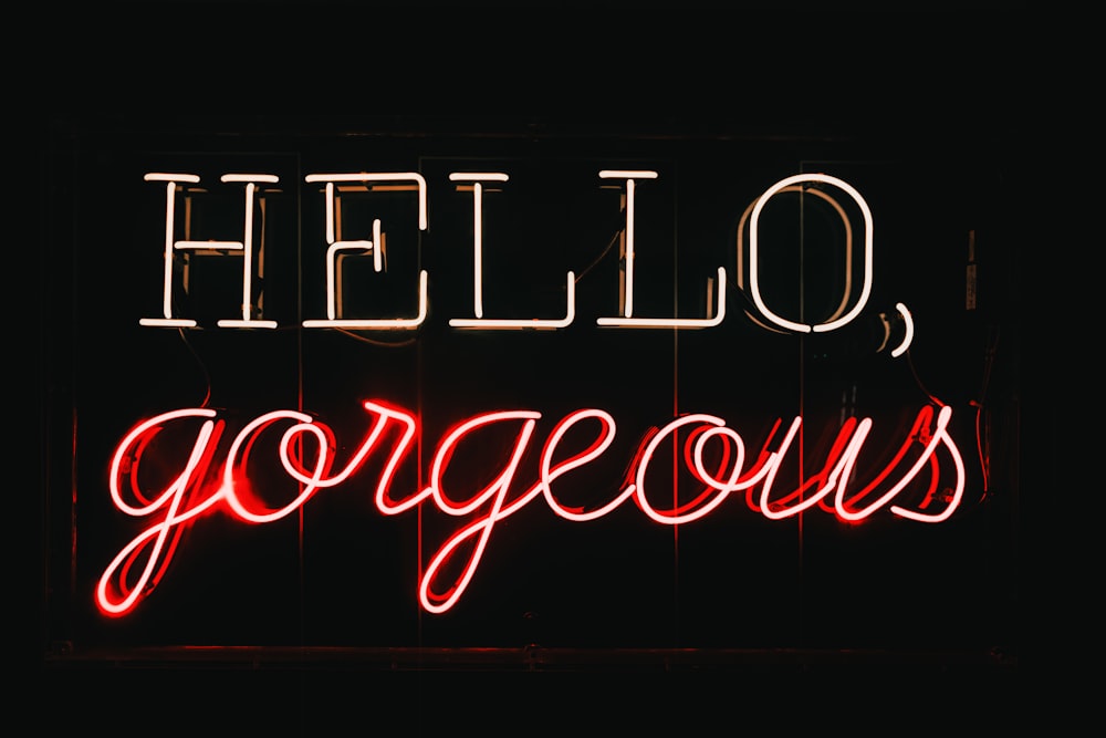 a neon sign that says hello, gorgeous