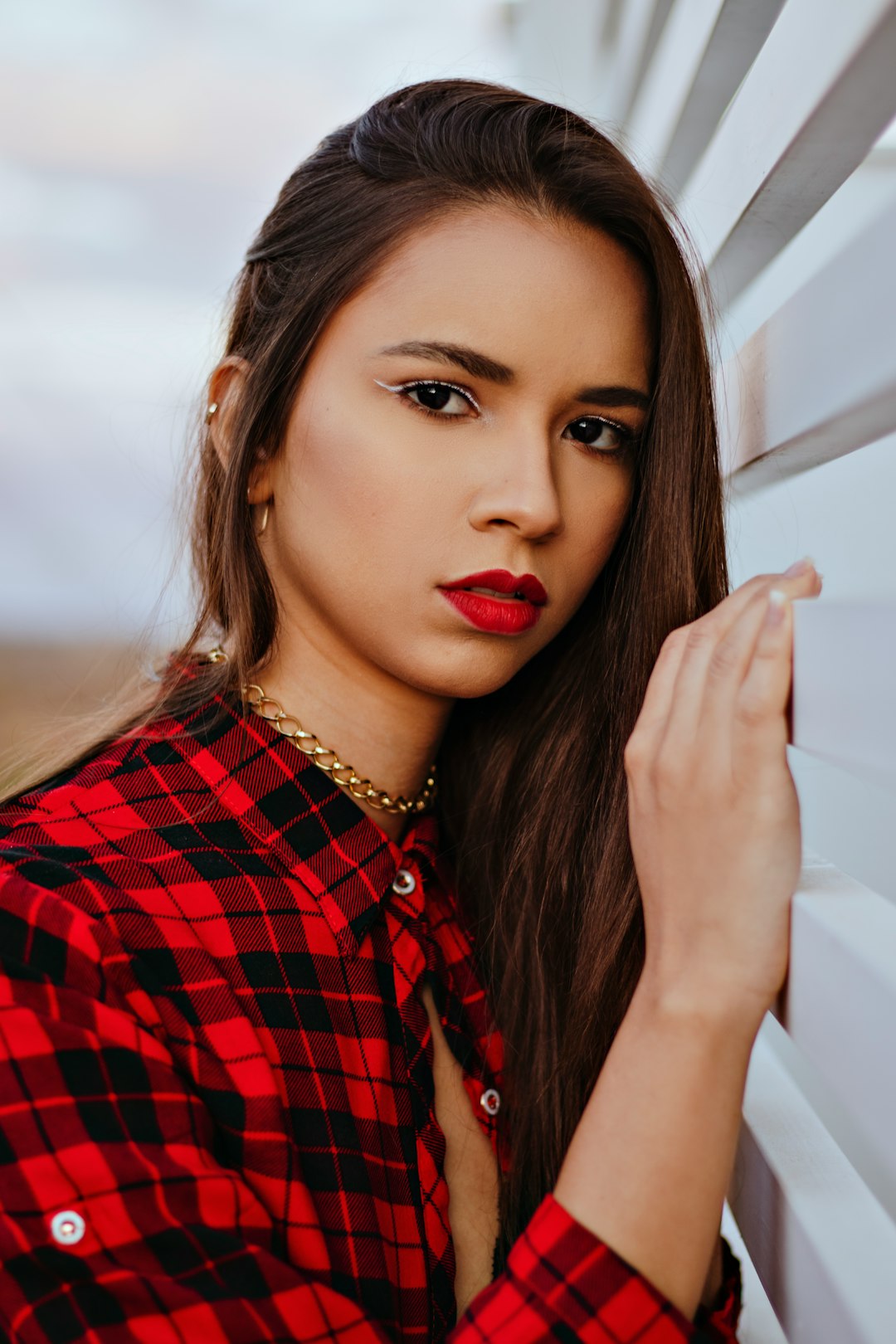 woman in red and black plaid dress shirt