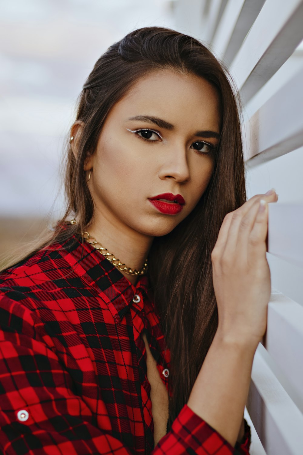 woman in red and black plaid dress shirt